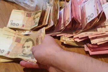 Гроші. Фото: скріншот YouTube-відео