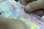 Деньги. Фото: скриншот YouTube-видео