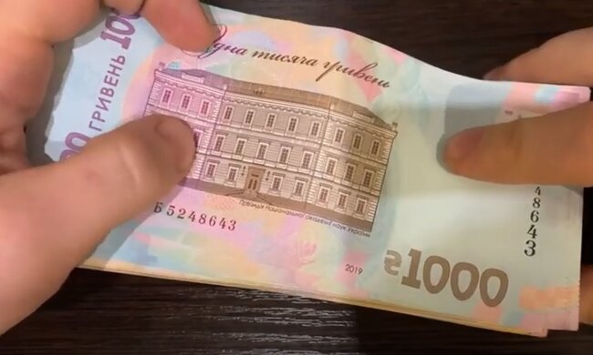 Деньги. Фото: скриншот YouTube-видео