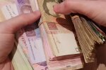 Деньги.  Фото: скриншот YouTube-видео
