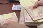 Деньги. Фото: скриншот YouTube-видео