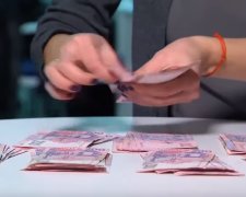 Деньги, фото: скриншот с youtube