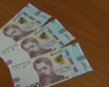 Банкноты в 1000 грн. Фото: скриншот YouTube-видео