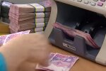 Деньги. Фото: скриншот YouTube-видео