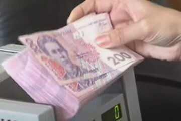 Гривня. Фото: скріншот YouTube-відео