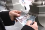 Гривна. Фото: скриншот YouTube