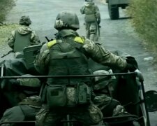 Украинские военнослужащие. Фото: скриншот  Youtube