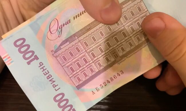 Деньги.  Фото: скриншот YouTube-видео