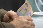 Деньги. Фото: скриншот YouTube-видео
