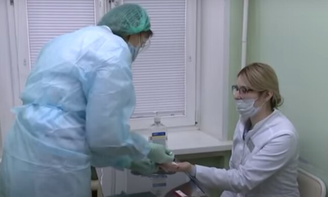 Тест на коронавирус. Фото: скриншот YouTube