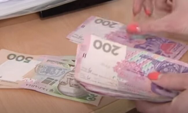 Деньги. Фото: скриншот YouTube-видео