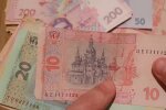 Деньги.  Фото: скриншот YouTube-видео