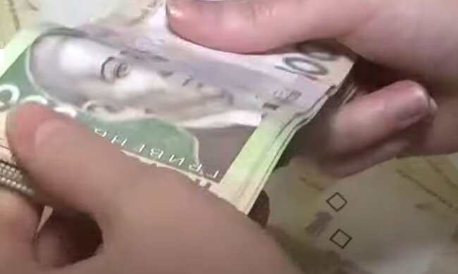 Деньги. Фото: скриншот YouTube-видео