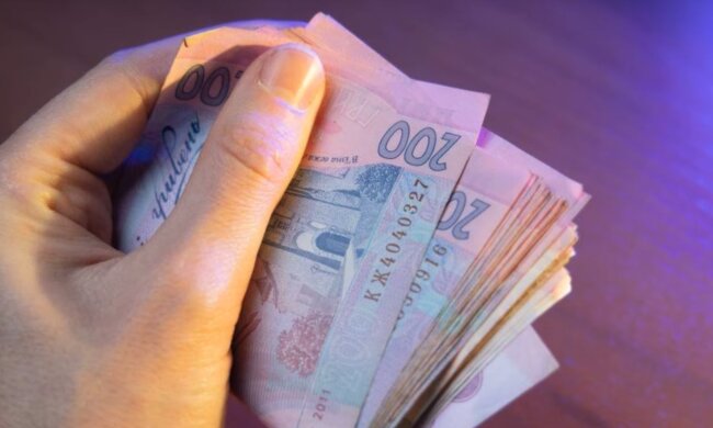 Деньги. Фото: скриншот YouTube-видео