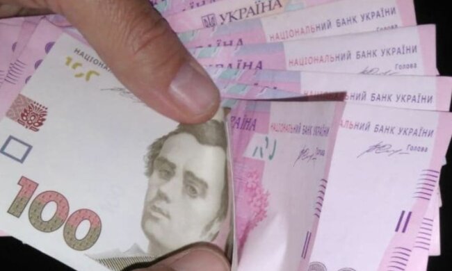Тисяча від Зеленського: правила оформлення змінили, хто може отримати тепер. Фото: Ukrainianwall