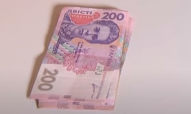 Деньги. Фото: скриншот YouTube-видео