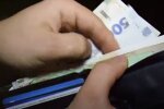 Кошелек. Фото: скриншот YouTube-видео