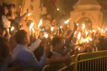 Благодатный огонь. Фото: скриншот YouTube.