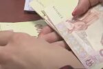 Деньги. Фото: скриншот YouTube-видео
