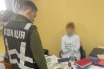 Задержание чиновницы МСЭК. Фото: Нацполиция Украины