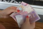 Деньги. Фото: скриншот YouTube-видео