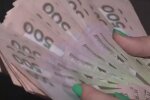 Деньги. Фото: скриншот YouTube-видео