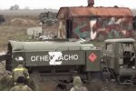 Разбитая техника рф в Чернобаевке. Фото: скриншот YouTube-видео