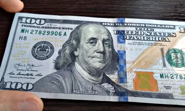 Доллары США. Фото: скриншот Youtube-видео