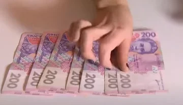 Деньги. Фото: скриншот YouTube-видео