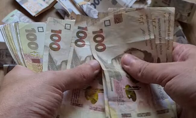 Деньги.  Фото: скриншот YouTube-видео