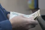 Деньги. Фото: скриншот YouTube-видео