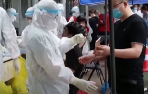 Коронавирус в Китае. Фото: скриншот YouTube
