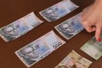 Деньги. Фото: скриншот YouTube-видео