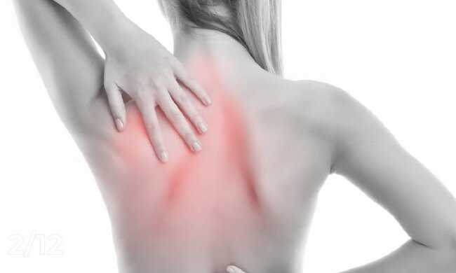 Біль у спині. Фото: YouTube