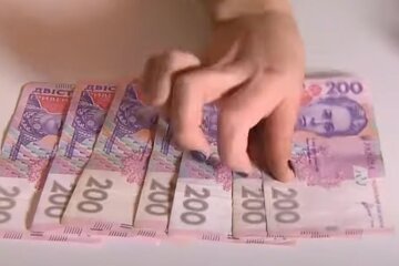 Деньги. Фото: скриншот YouTube-видео