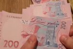 Деньги.  Фото: скриншот YouTube-видео