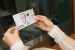 Деньги.  Фото: скриншот YouTube-видео