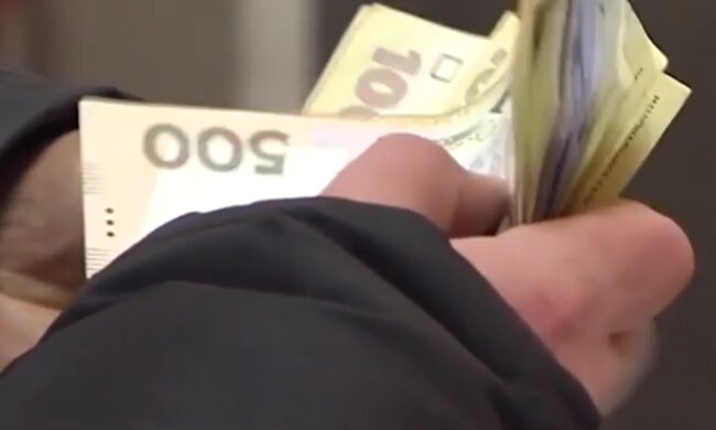 Деньги. Фото: скриншот YouTube-видео