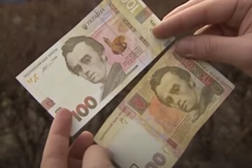 Купюры 100 грн. Фото: скриншот YouTube-видео