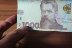 Деньги. Фото: скриншот YouTube-видео