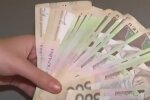 Деньги. Фото: скриншот YouTube-видео