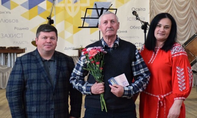 Живая стена между человечеством и атомом: на Подоле почтили героев-ликвидаторов