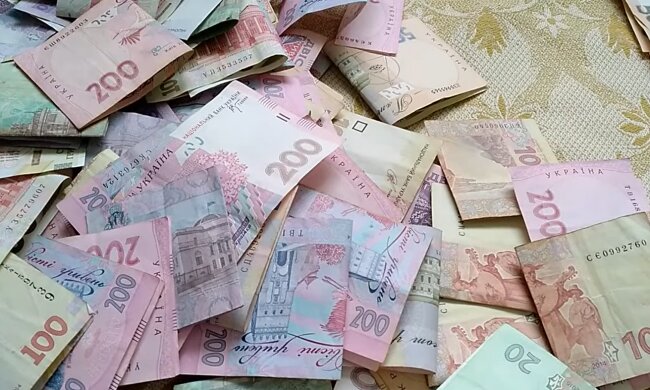 Деньги.  Фото: скриншот YouTube-видео