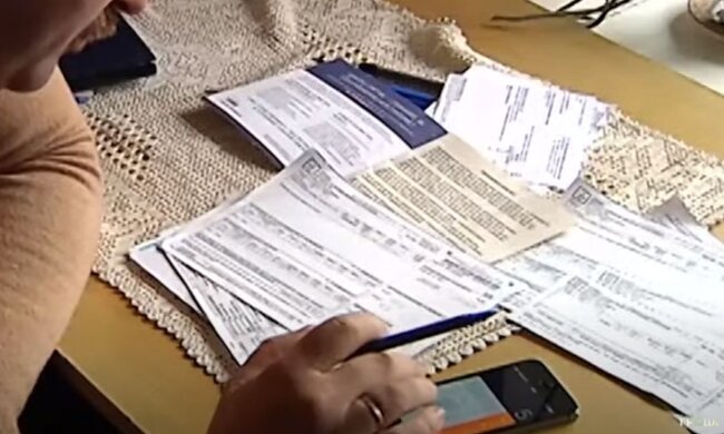 Комунальні платежі. Фото: скріншот YouTube-відео