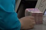 Деньги. Фото: скриншот YouTube-видео