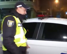 Співробітник поліції. Фото: скріншот YouTube-відео