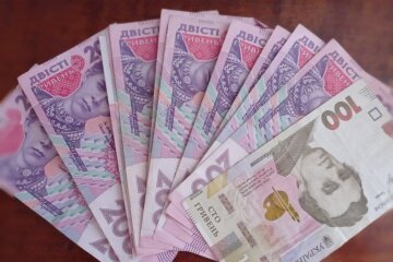 Деньги. Фото: скриншот YouTube-видео