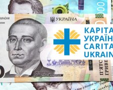 Грошова допомога від Карітас. Фото: Telegram