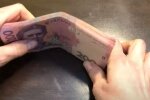 Деньги. Фото: скриншот YouTube-видео