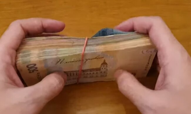 Гроші. Фото: скріншот YouTube-відео